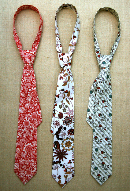 Three ties are arranged in a line.