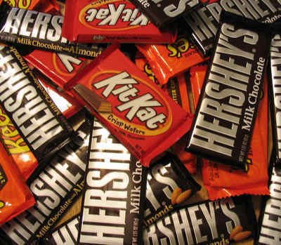 A huge pile of Hershey's bars and KitKats.