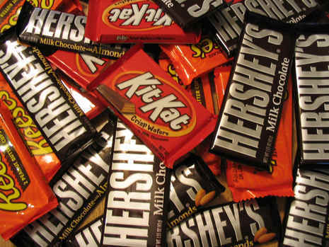 A huge pile of Hershey's bars and KitKats.