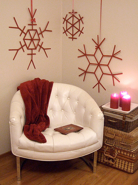 Giant red craft stick snowflakes