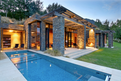 A modern style home with a pool