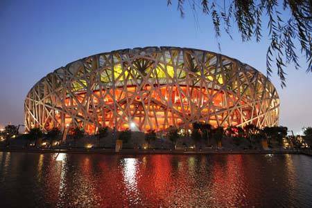Photo taken on Aug. 5, 2008 shows the National Stadium, nicknamed the Bird's Nest, in the evening in Beijing, China. Beijing witnessed a fine weather Tuesday. (Xinhua/Guo Lei)