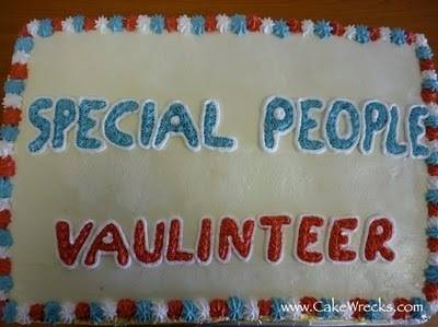 A white cake with red, white and blue frosting and the words, special people vaulinteer.