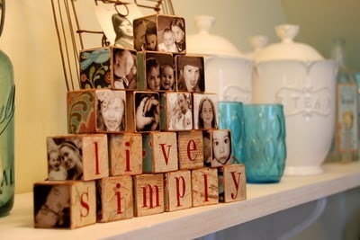 Building blocks that have pictures of family and friends on them.