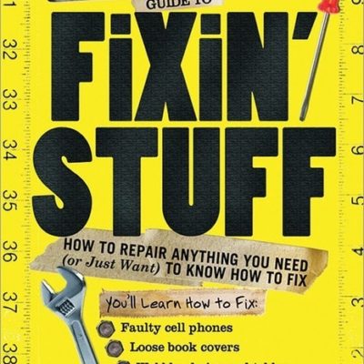 A fix it book is yellow with tools.