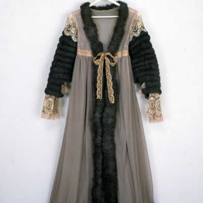 A medieval looking dress that's gray and black.