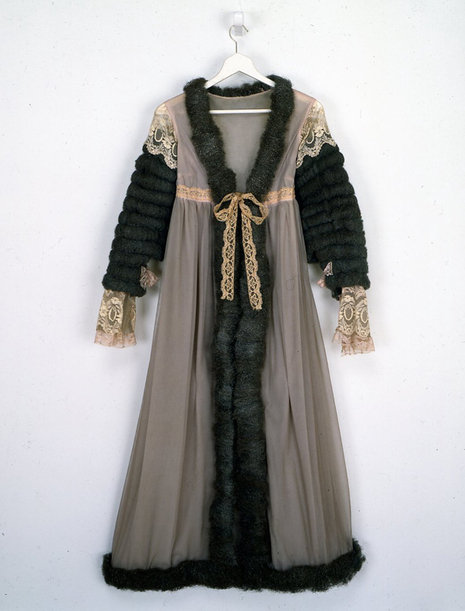 A medieval looking dress that's gray and black.