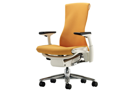 A modern office chair has Chrome legs and orange upholstery