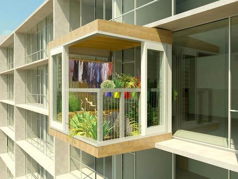 Open balcony with potted plants and space for drying cloths.