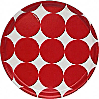A paper plate is beige with a large red dots on it.