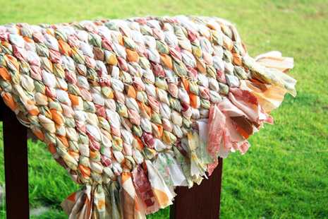 Recycle your old bed sheet into a lovely woven rag rug.
