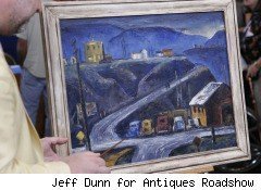 A framed painting of a small mountainous village.