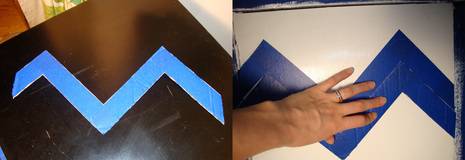 Tape in between each pencil line until the entire cabinet is a taped chevron pattern.