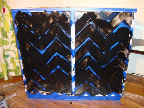 Paint the un-taped surfaceglossy black