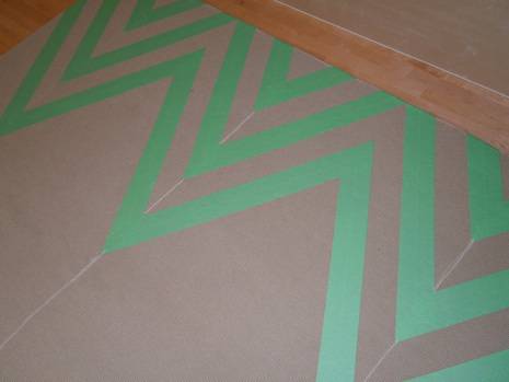 A Green color Lined Rug"