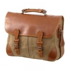 Chocolate color leather bag with clips for laptop.