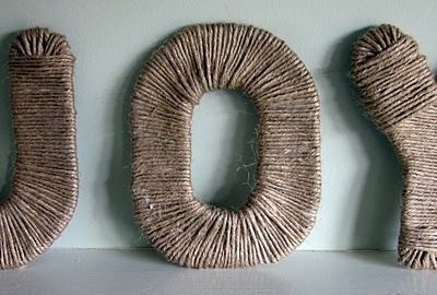It displays the letters JOY which made from jute.