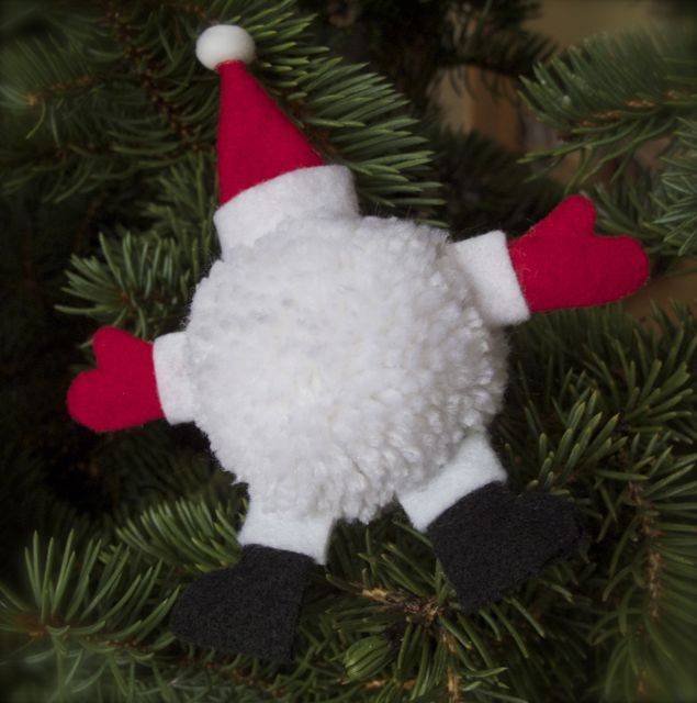 A christmas tree ornament of santa claus splayed out