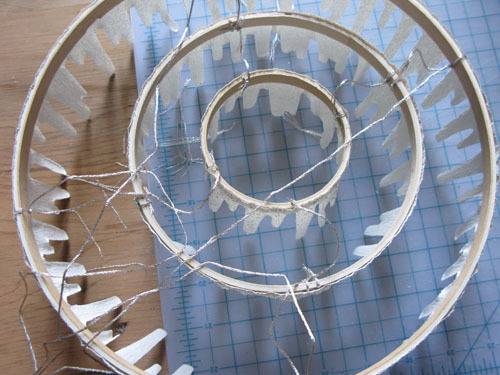 Credit: Katy Elliot [http://www.katyelliott.com/blog/2009/12/diy-icicle-chandelier.html]