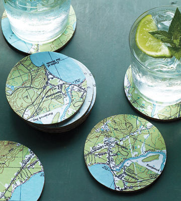 Several assorted coasters with maps on them.