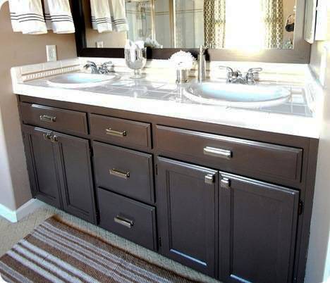 Wooden sink cabinet with mirror.