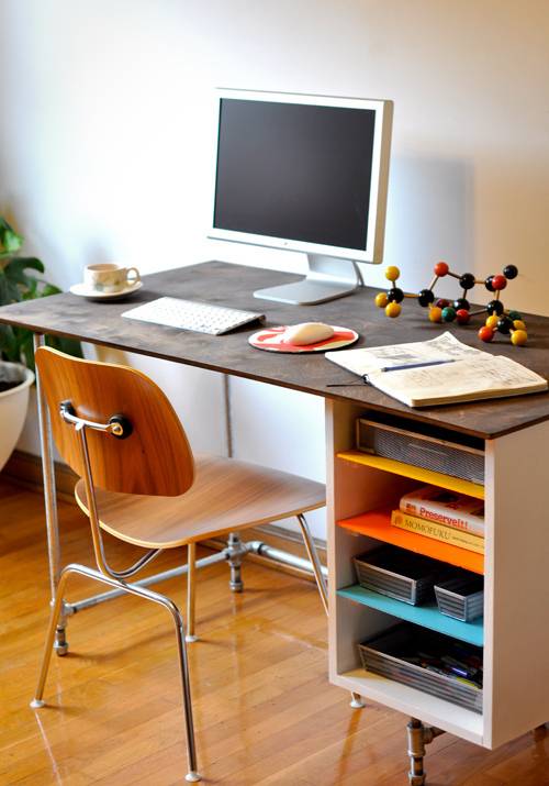 An awesome DIY pipe desk, from our eBook, Make It! Hardware Store Decor