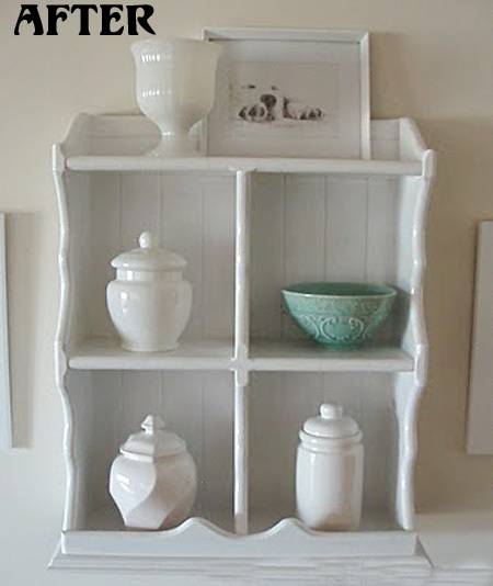 There are some jars and bowls in the shelf.