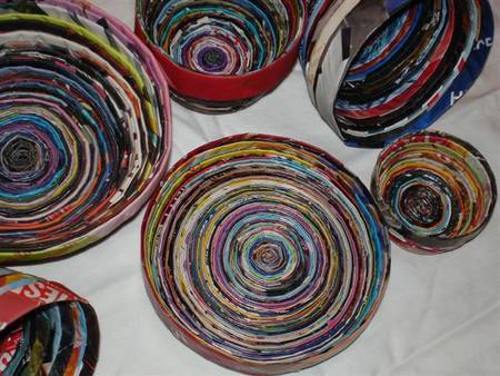 Rolled magazines make artistic items.