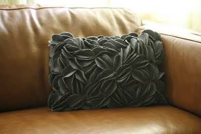 Grey color pillow on sofa.