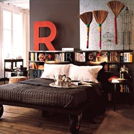 Broomsticks hanging on the wall.