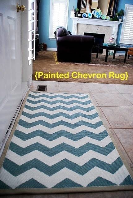 Blue and white pattern painted chevron rug.