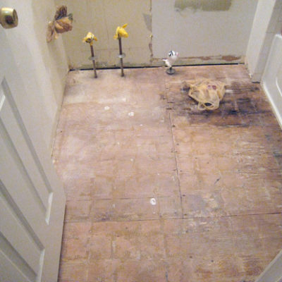 An overhead view of a bathroom in the middle of a major renovation.