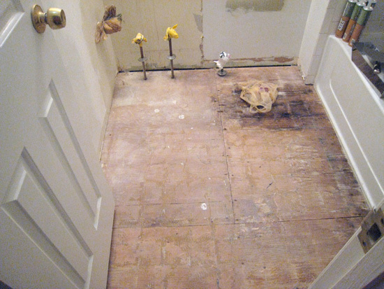 An overhead view of a bathroom in the middle of a major renovation.