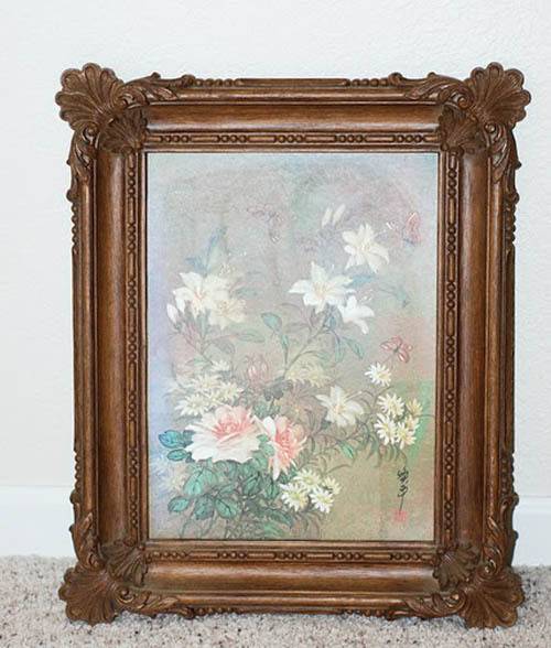 Floral picture in the frame.