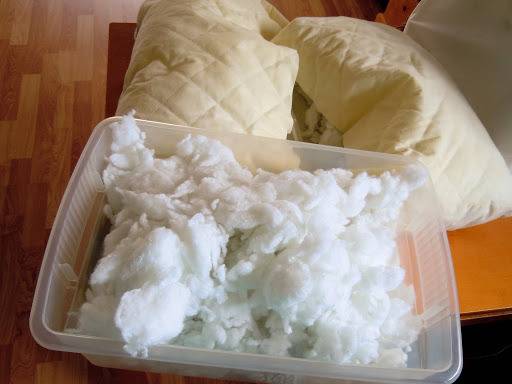 Cotton fiber in a plastic box to make pillows.