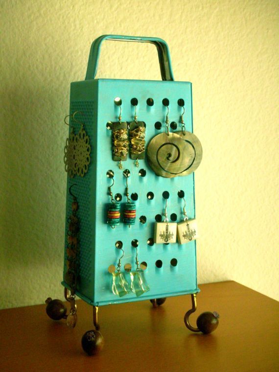 Kitchen grater turns into an earring holder.