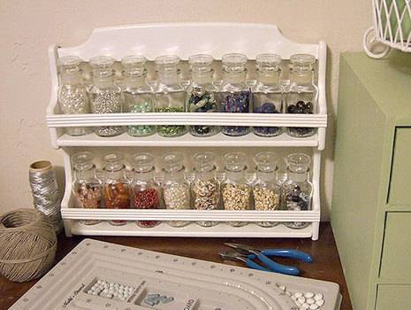 Painted rack with jars of beads