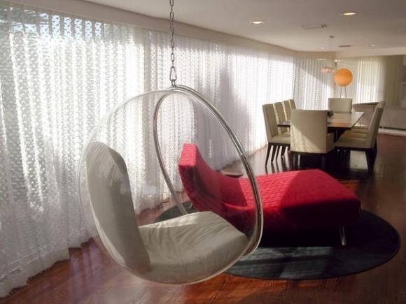 Modern Dining Room Idea with Suspended Bubble Chair