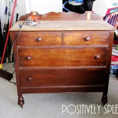 " A   dresser  table  in a room "