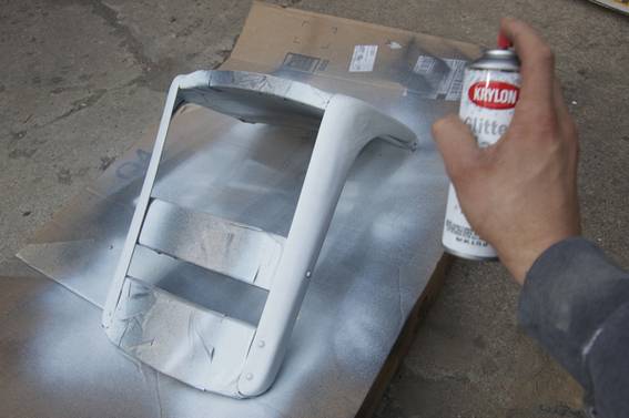 Spraying the seat with 'diamond dust' Glitterblast paint