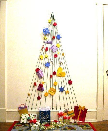 A decorated Christmas tree wall art.