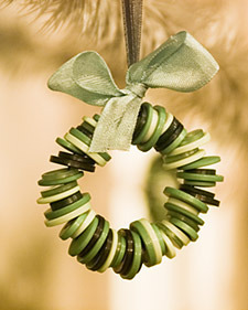 A necklace made of green discs and a bow.