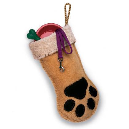 A Christmas stocking that looks like a dog's paw.
