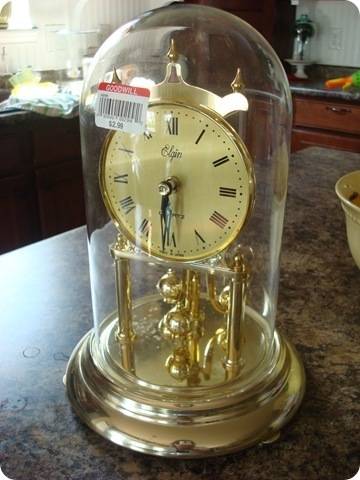 A clock kept inside the glass.