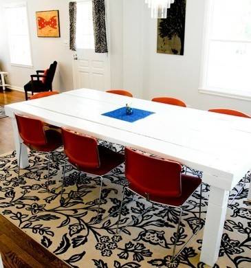 Dining table with chairs in dining room.