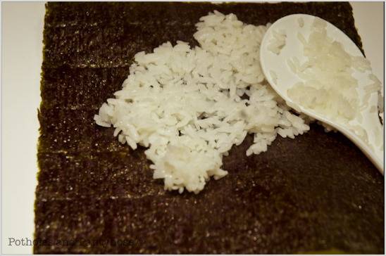 Sushi making with rice.