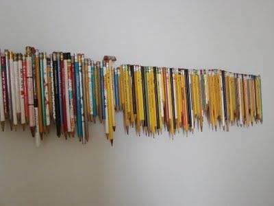 Try this DIY pencil art to your living room wall.