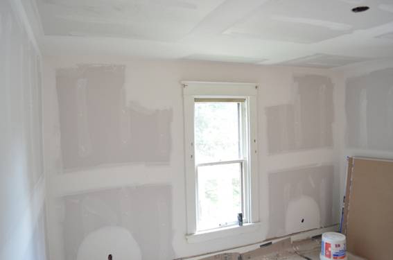 One of the bedrooms with a fresh coat of sheetrock and mud