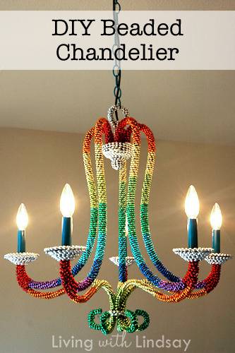 A colorful rainbow chandilier is lit.