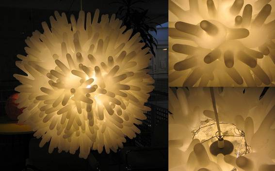 A ball in made out of yellow limb looking things.